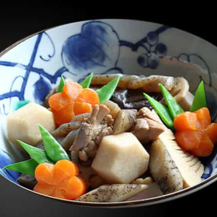 Gameni A hodgepodge of boldly sliced tubers, mushrooms, and hornbill tenders, stewed slowly in a soy-based broth.