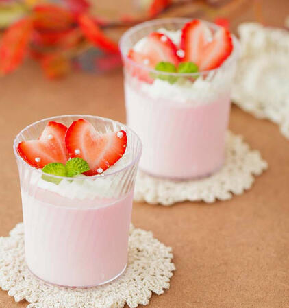 Hingan Milk Pudding A creamy pudding topped with fresh spring berries and a whipped cream topping.