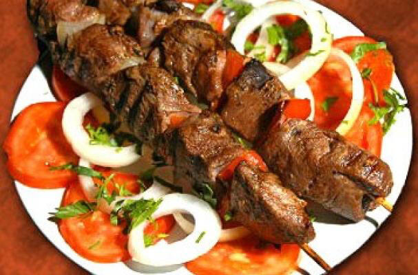 Beef Kebabs Beef, red peppers, tomatoes, and onions, skewered on a bamboo stick and roasted until juicy and smoky.