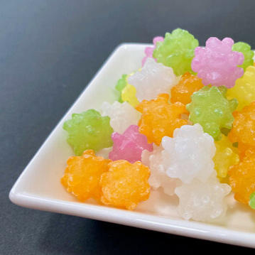 Konpeito Colorful clusters of crystalline sugar─a childhood treat for Hingans and Domans alike.